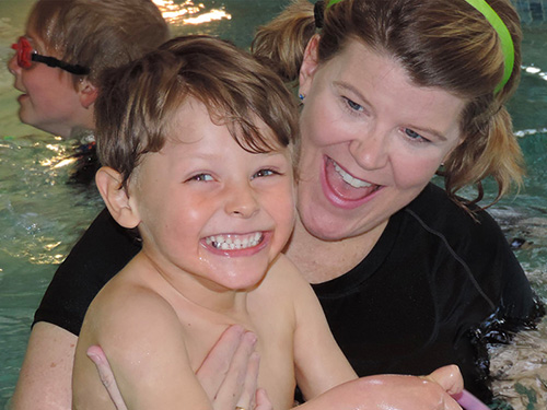 little boy enjoying the therapy pool
